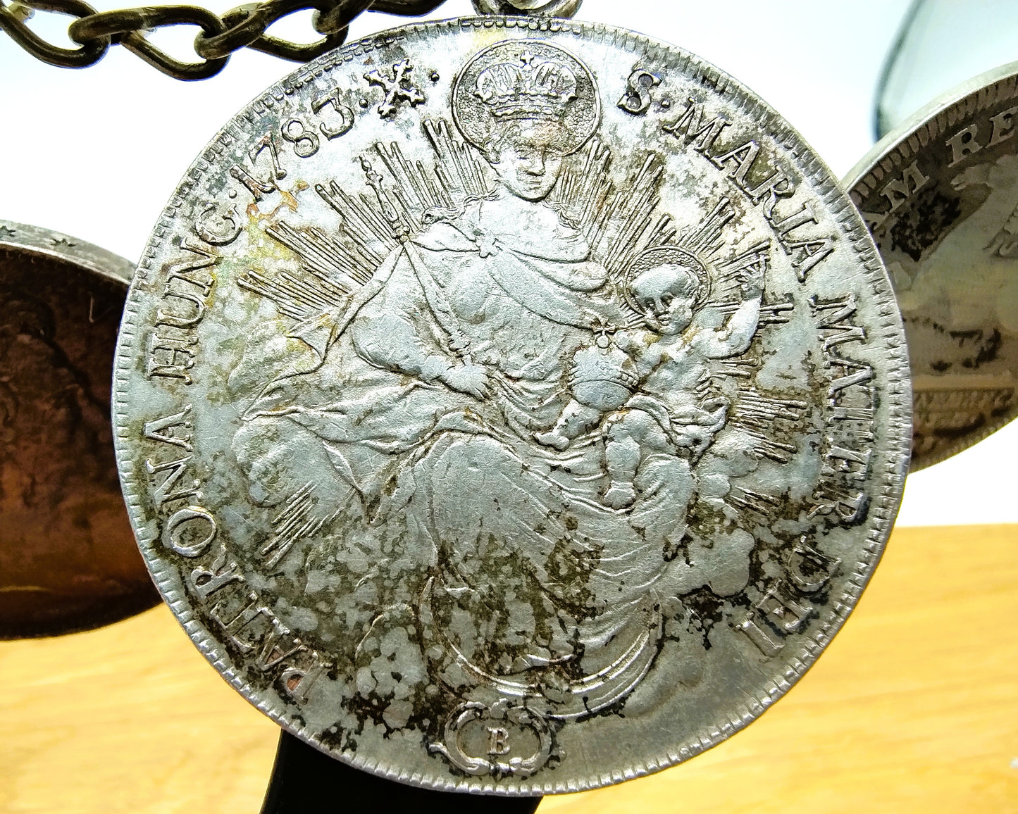 Display cabinet with 15 antique German coins, 16th to 19th century