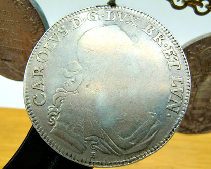 Display cabinet with 15 antique German coins, 16th to 19th century