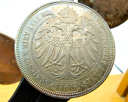 Display cabinet with 15 antique German coins, 16th to 19th century