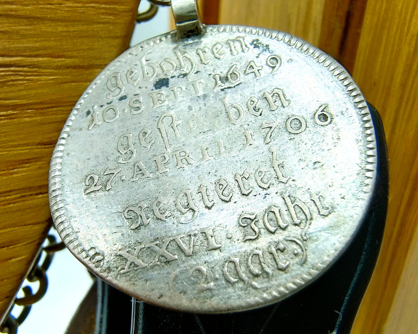 Display cabinet with 15 antique German coins, 16th to 19th century