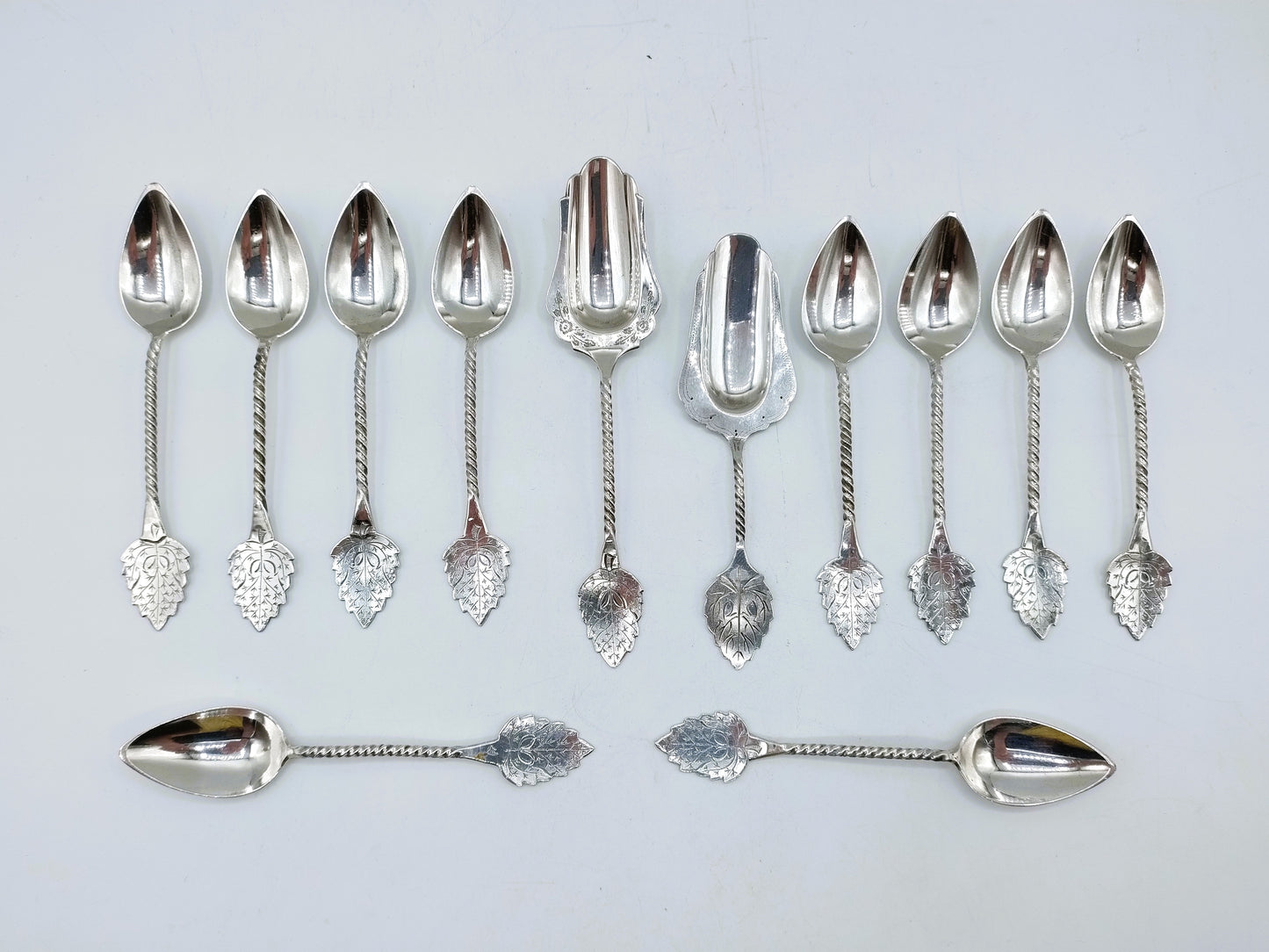 Set with silver teaspoons (10) and sugar spoons (2), J. Huisman, Schoonhoven