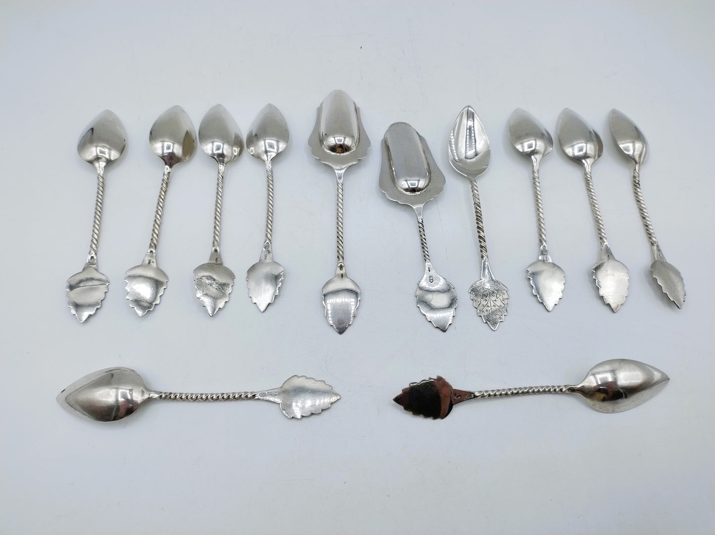 Set with silver teaspoons (10) and sugar spoons (2), J. Huisman, Schoonhoven