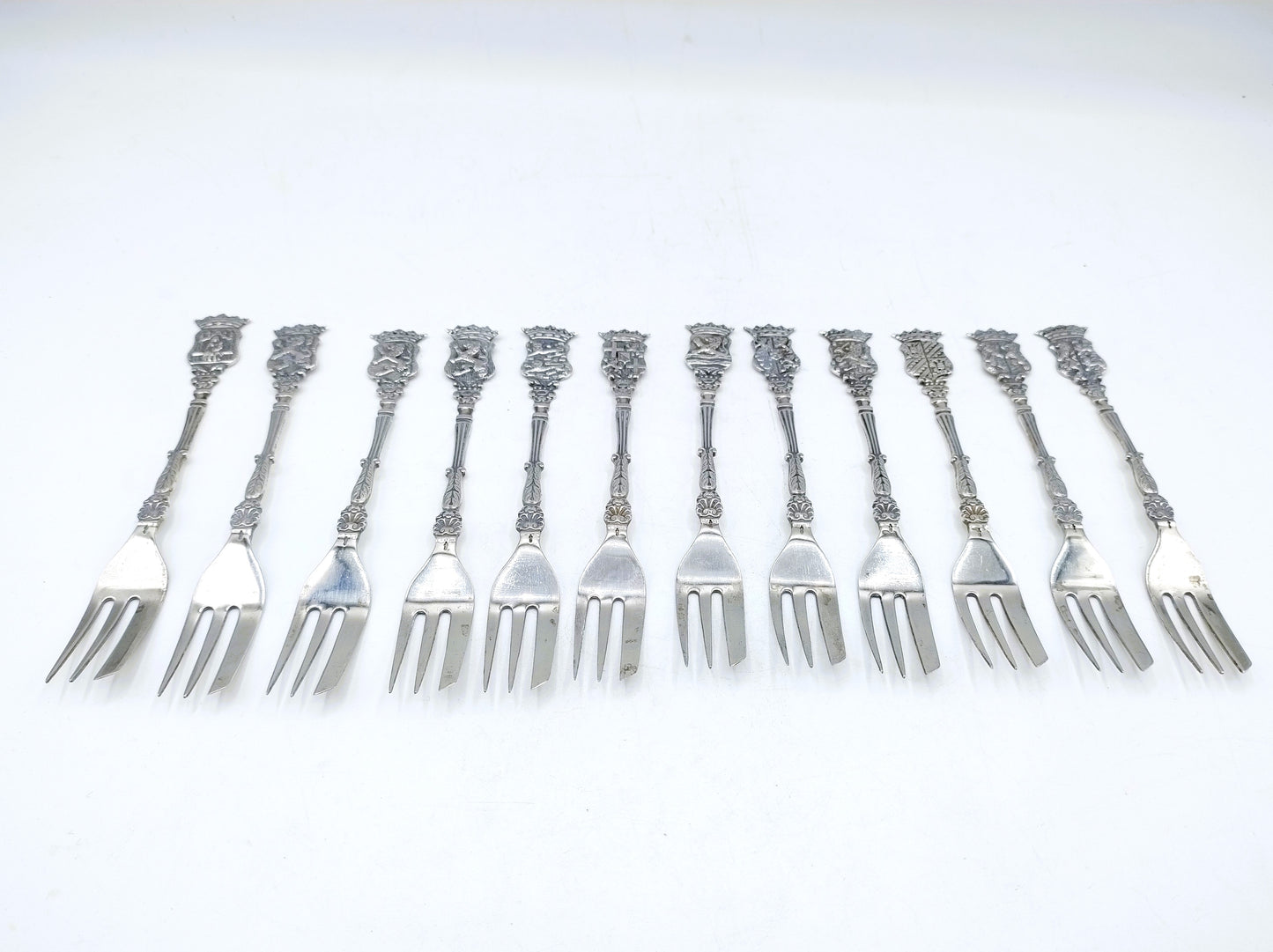 Set with 12 silver cake forks, A. Mesker, Schoonhoven, 20th century