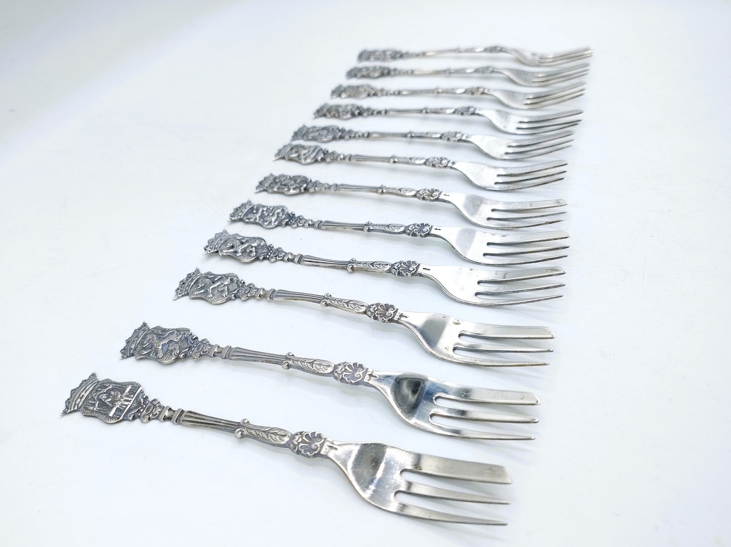 Set with 12 silver cake forks, A. Mesker, Schoonhoven, 20th century