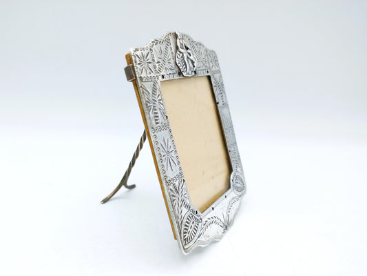 Silver photo frame of bag bracket with Keeshond, 18th century