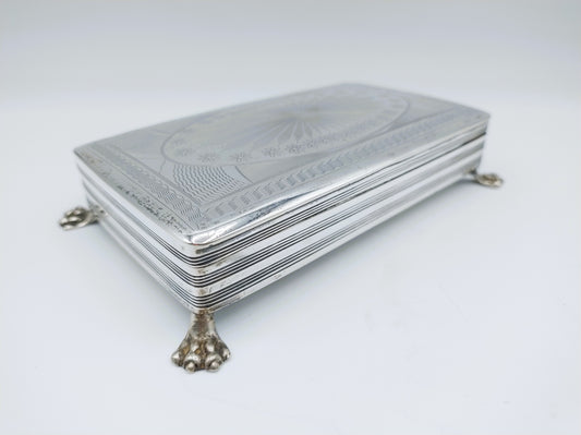 Silver jewelry box made from a tobacco box, 1839