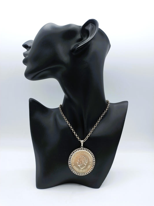 Silver jasseron necklace with silver 10 guilder pendant.