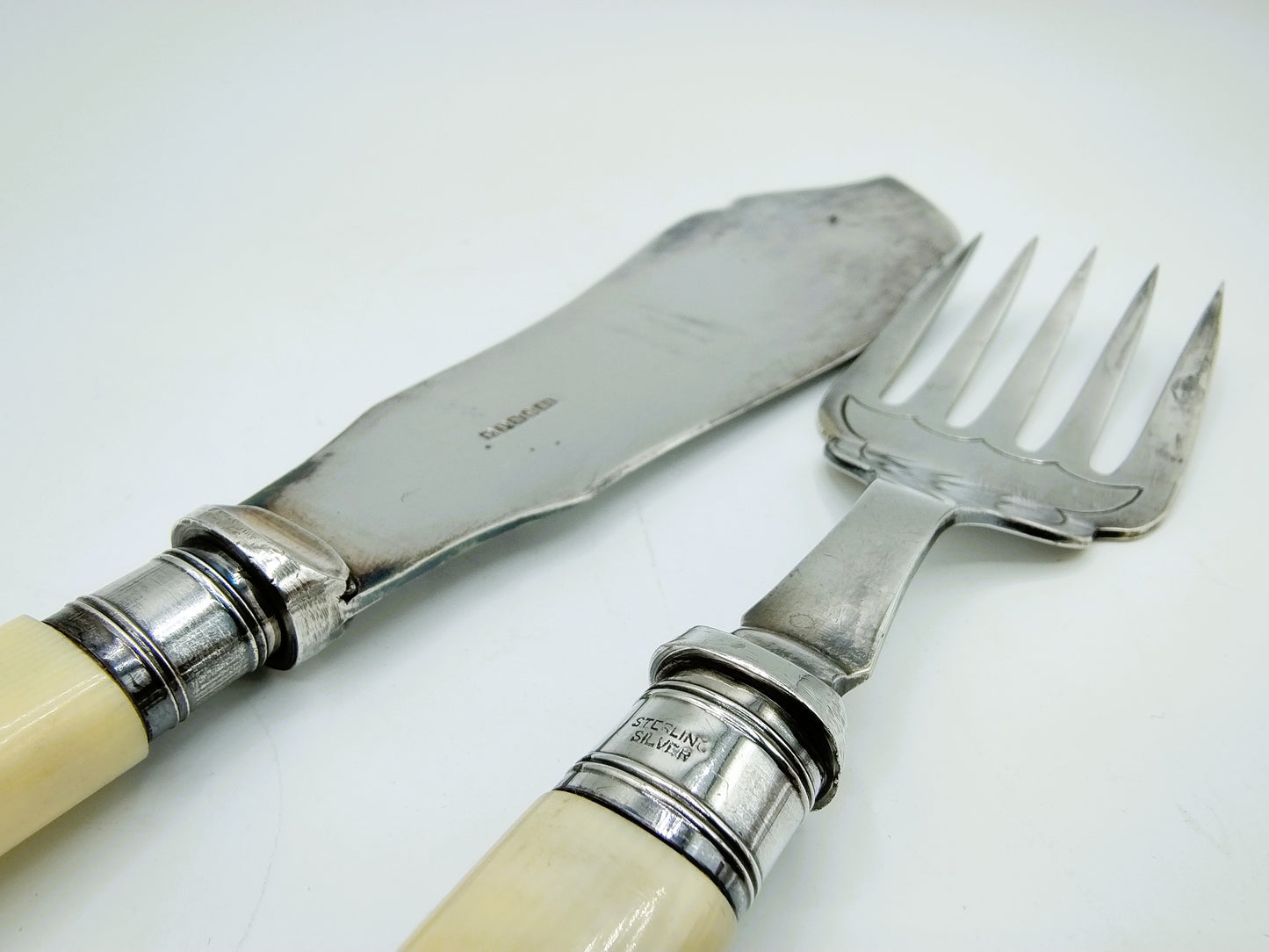 Fish cutlery with bone handles, silver / silver plated