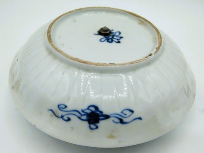 Silver candlestick on Chinese porcelain dish, AH Ankum, Zaandam, 18th century