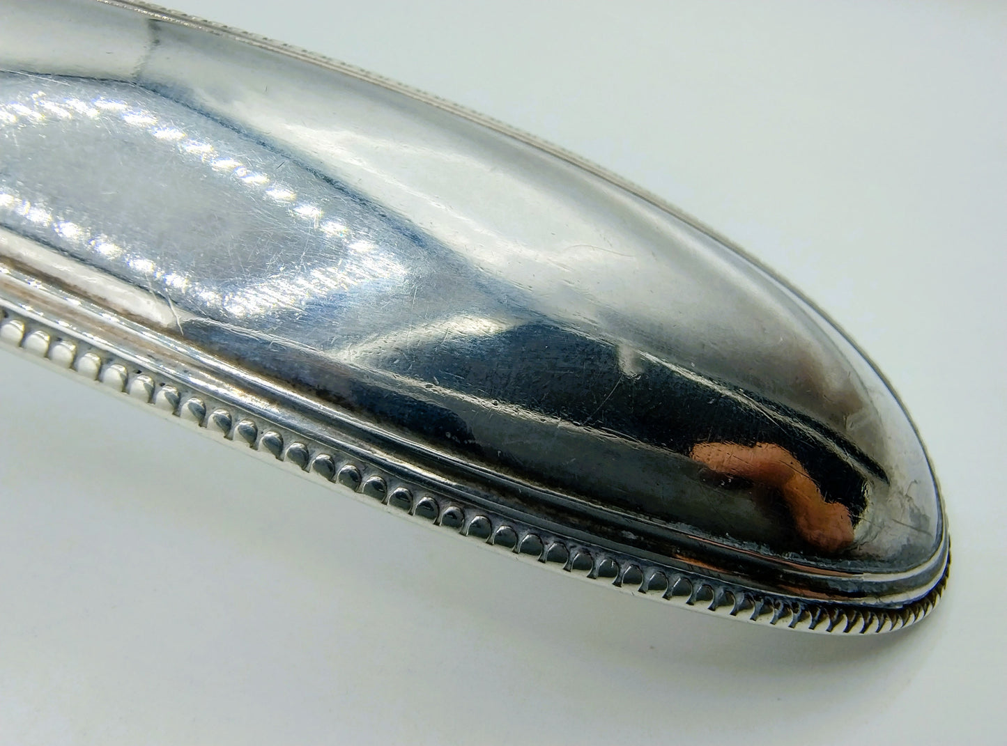 Silver soup spoon with pearl rim, Amsterdam, 19th century.