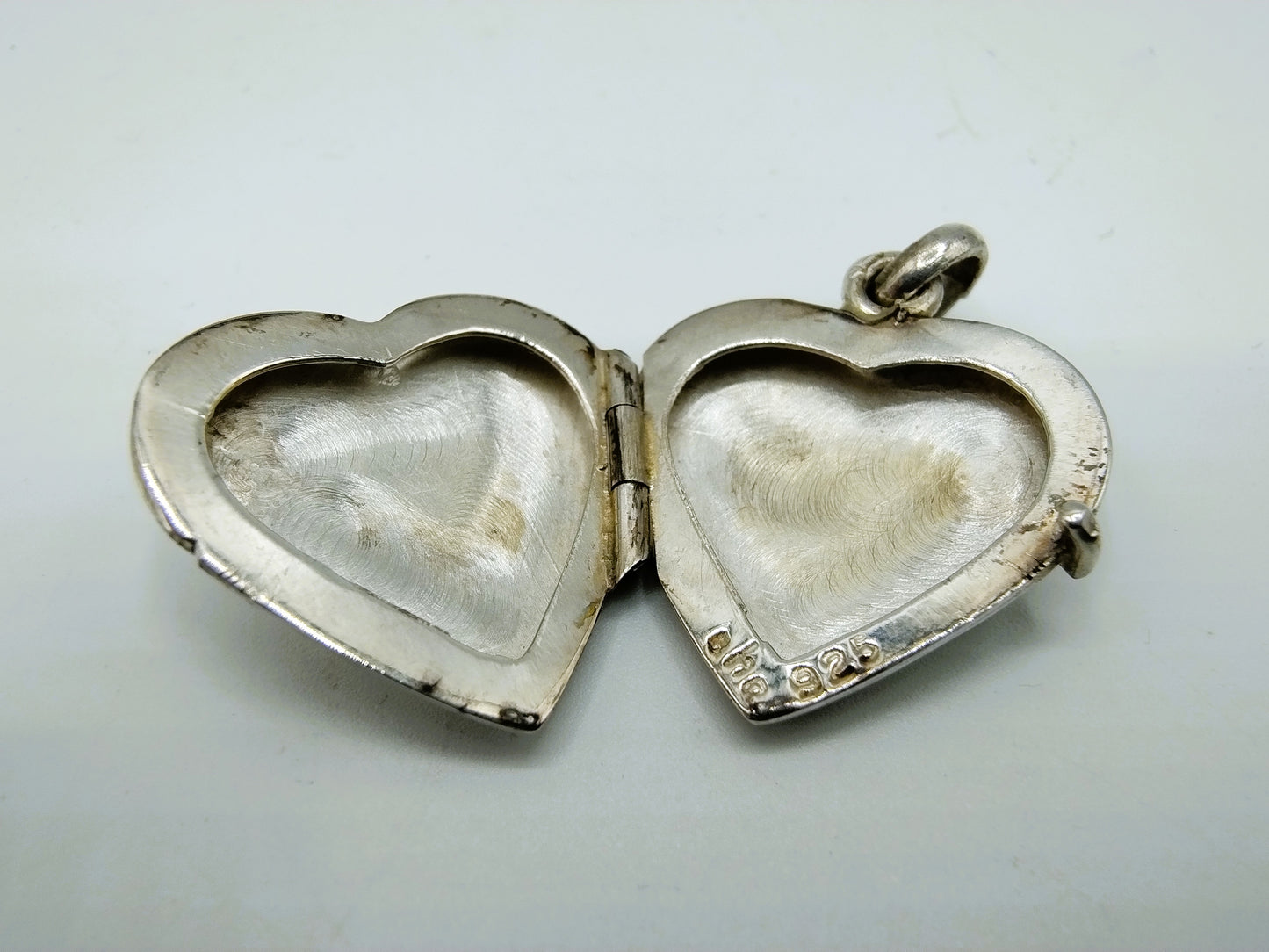 Silver medallion in heart shape, Jansen Post &amp; Cocks, Amsterdam.