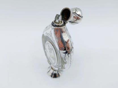 Crystal perfume bottle with silver fittings. 19th century.