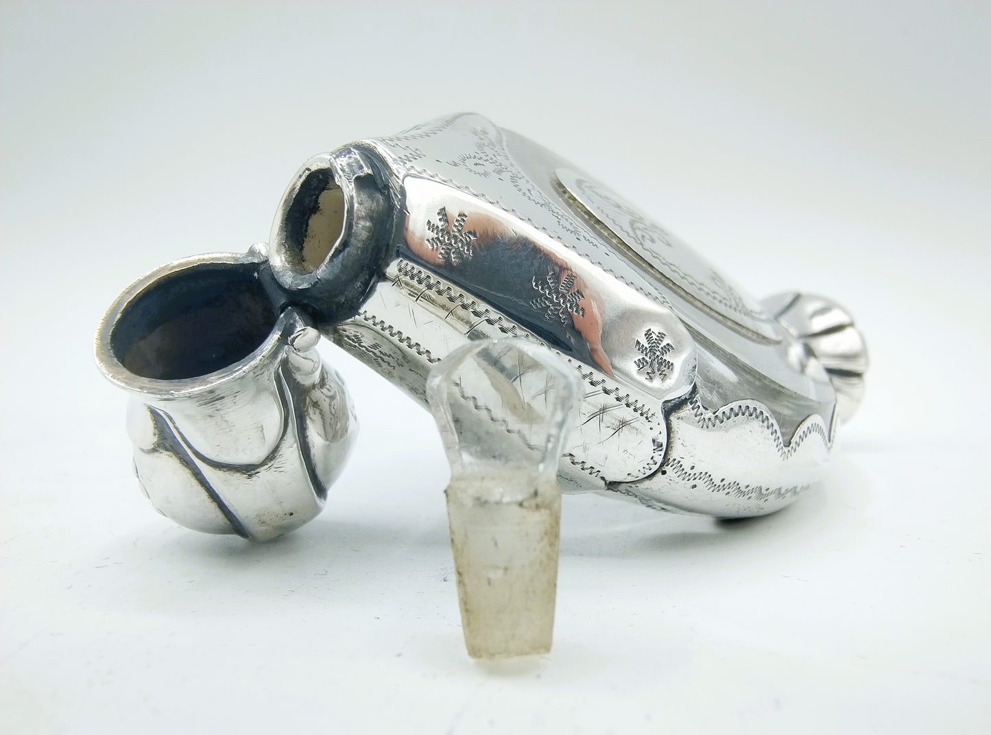 Crystal perfume bottle with silver fittings. 19th century.