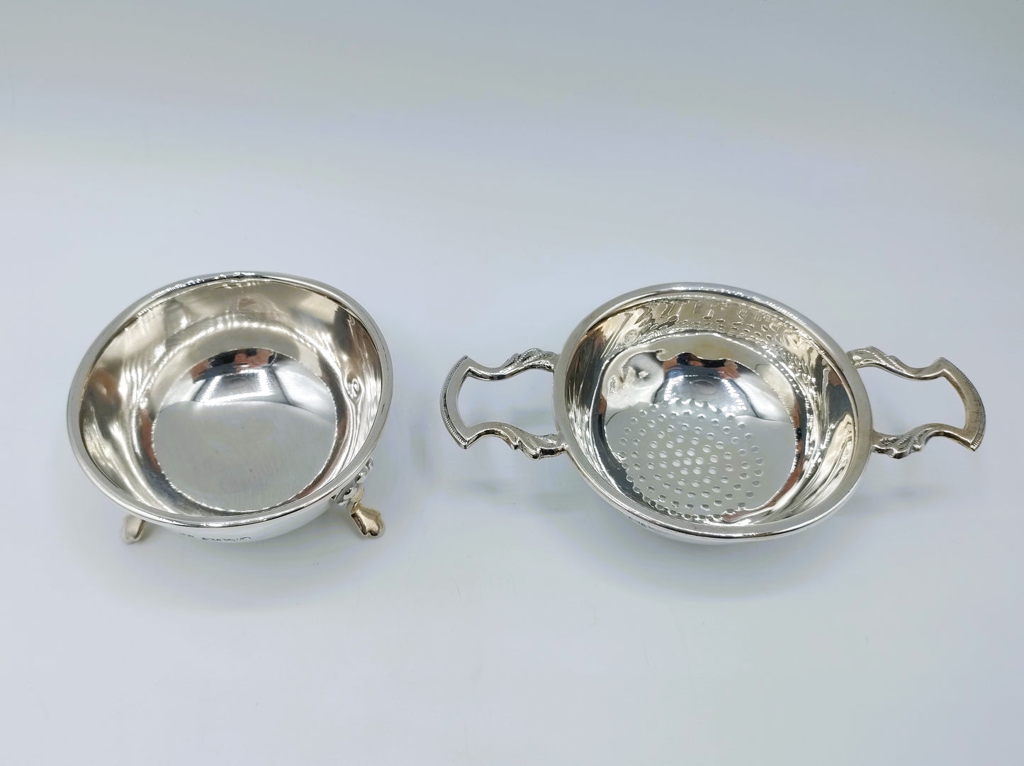 Silver tea strainer and drip tray, Barker Ellis Silver Co, Sheffield, 1979