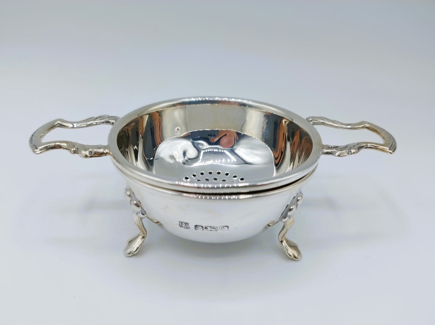 Silver tea strainer and drip tray, Barker Ellis Silver Co, Sheffield, 1979