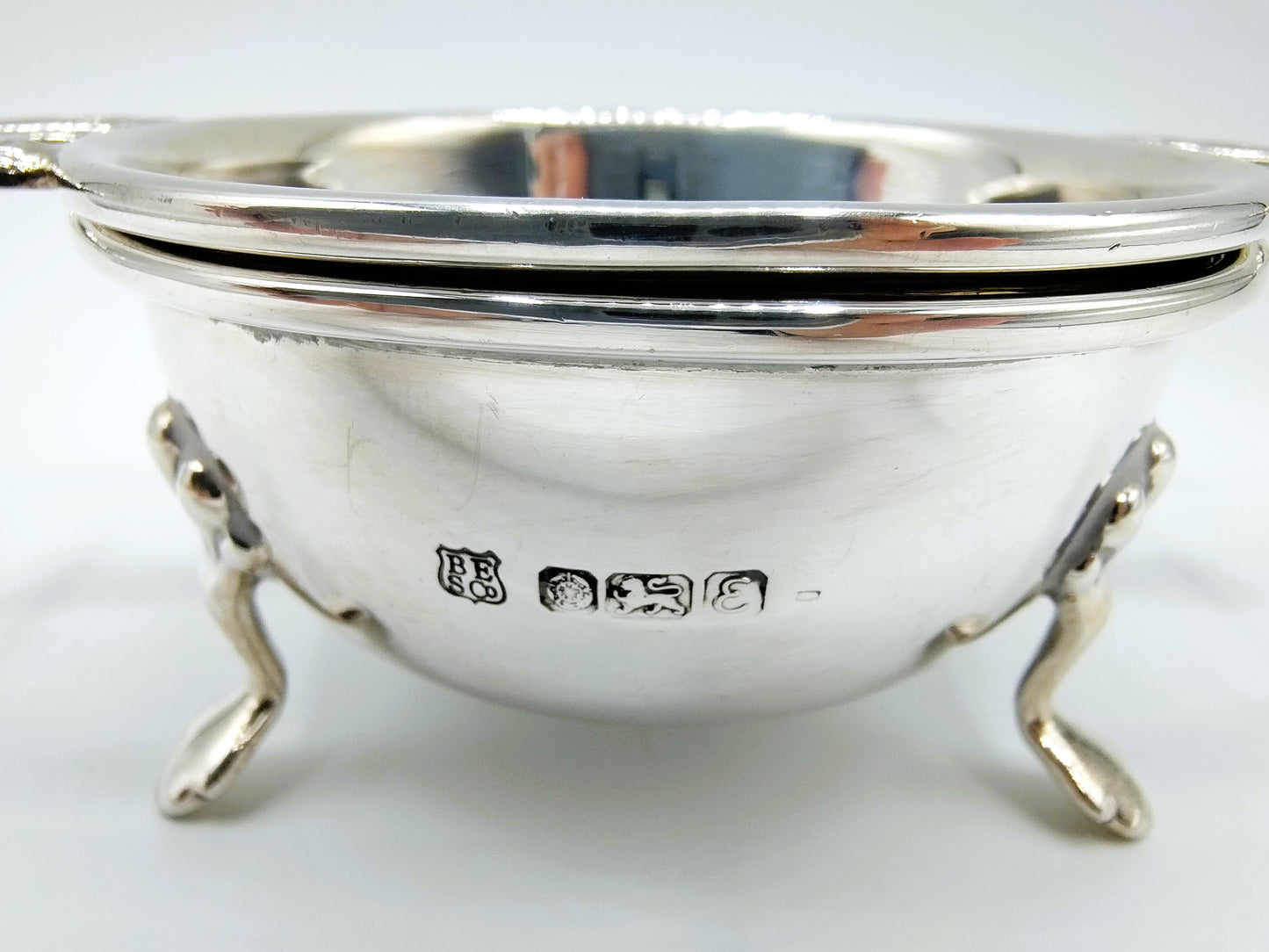 Silver tea strainer and drip tray, Barker Ellis Silver Co, Sheffield, 1979