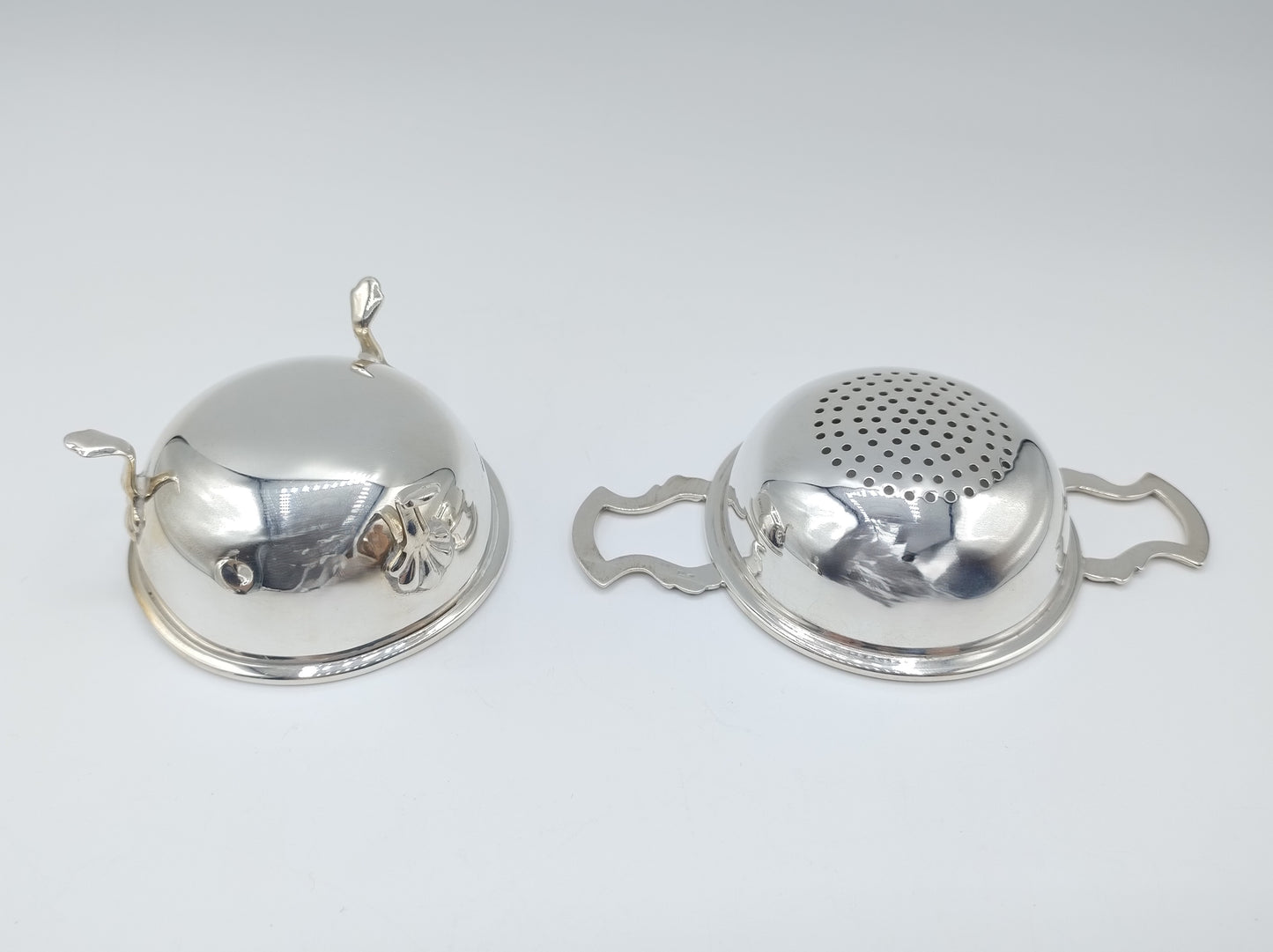 Silver tea strainer and drip tray, Barker Ellis Silver Co, Sheffield, 1979