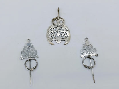 Silver Berber fibulas + pendant, Tunisia, 20th century