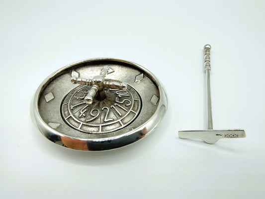 Silver roulette table with rotating centerpiece and stick, Amsterdam, 20th century