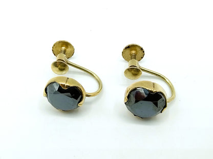 Gold screw earrings with black spinel