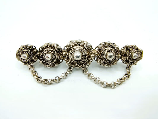 Silver Zeeland button brooch