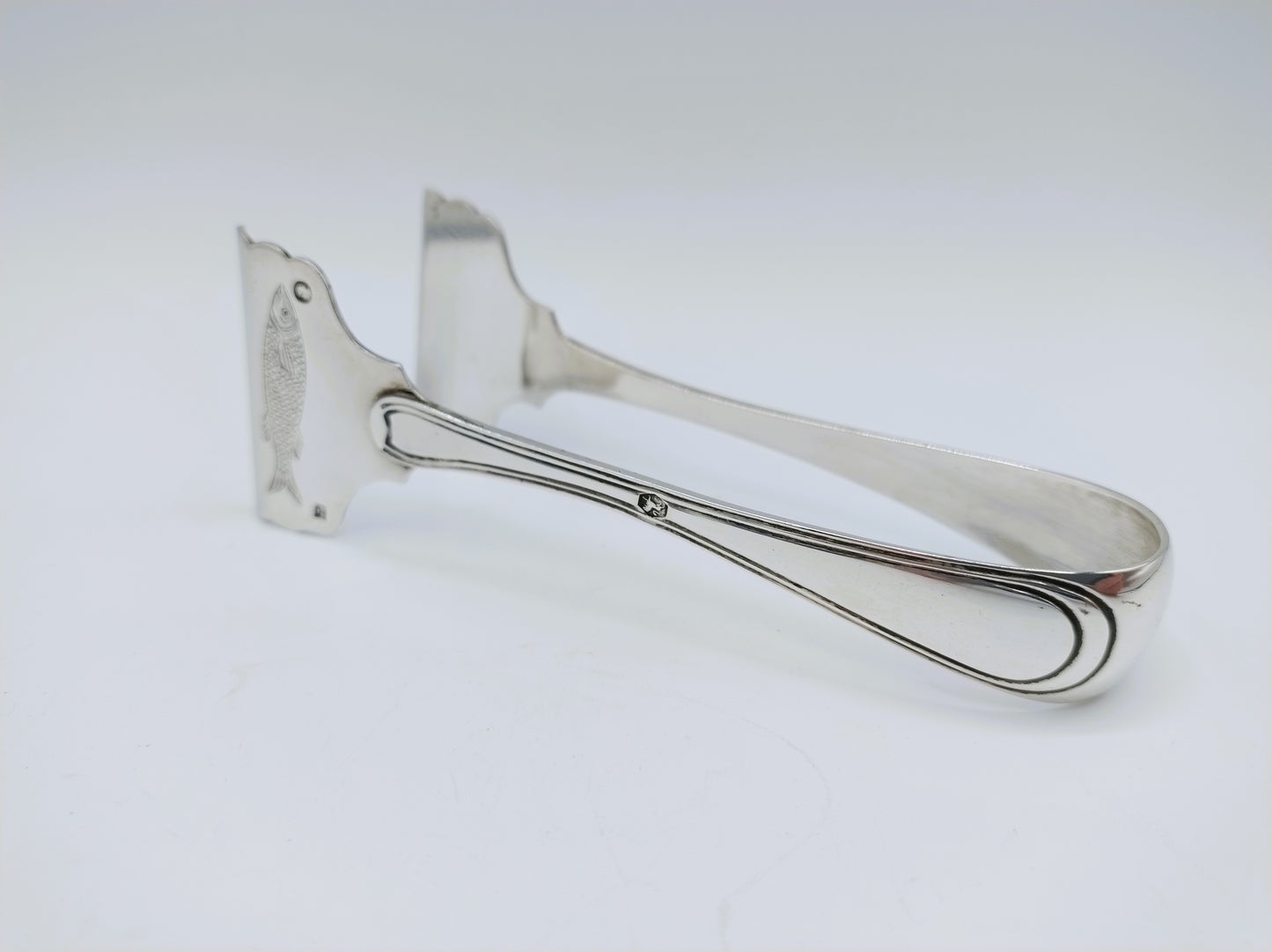 Silver sardine tongs, W. and Middendo Brick, Rotterdam, 1861