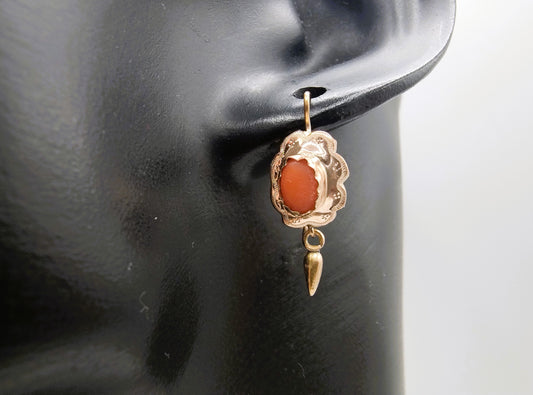 Gold earrings with blood coral