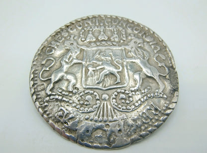 Silver trouser button brooch, 1865