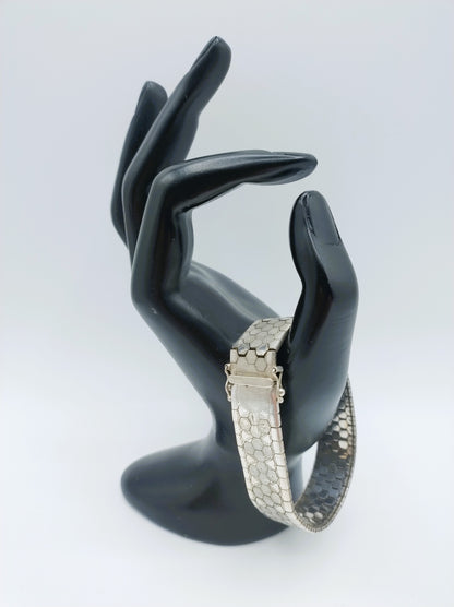 Zilveren armband met bloemmotief, 19,5 cm.