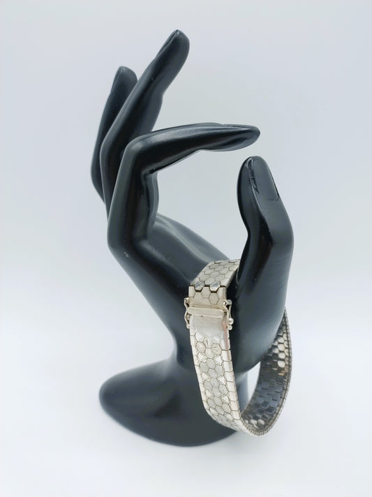 Zilveren armband met bloemmotief, 19,5 cm.