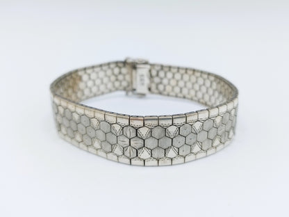 Zilveren armband met bloemmotief, 19,5 cm.