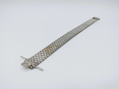 Zilveren armband met bloemmotief, 19,5 cm.