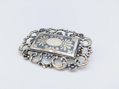 Zilveren broche met nielo inleg,  925