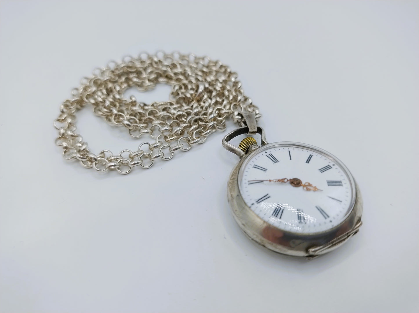 Zilveren jasseronketting met zilveren horloge hanger, 81 cm.