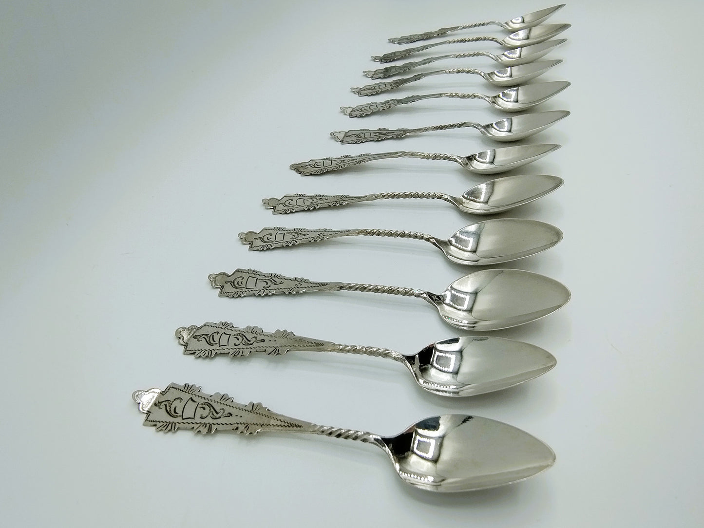 12 Zilveren theelepels, G. Huisman en G. v.d. Berg, ca. 1925