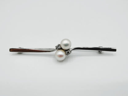 Zilveren broche met zirkonia's en parels