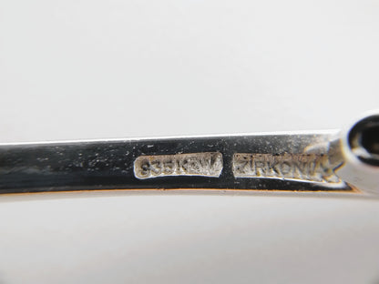 Zilveren broche met zirkonia's en parels