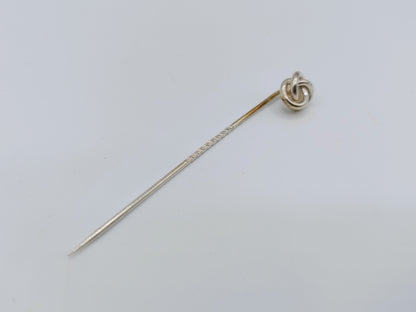 Zilveren reversspeld met knoop