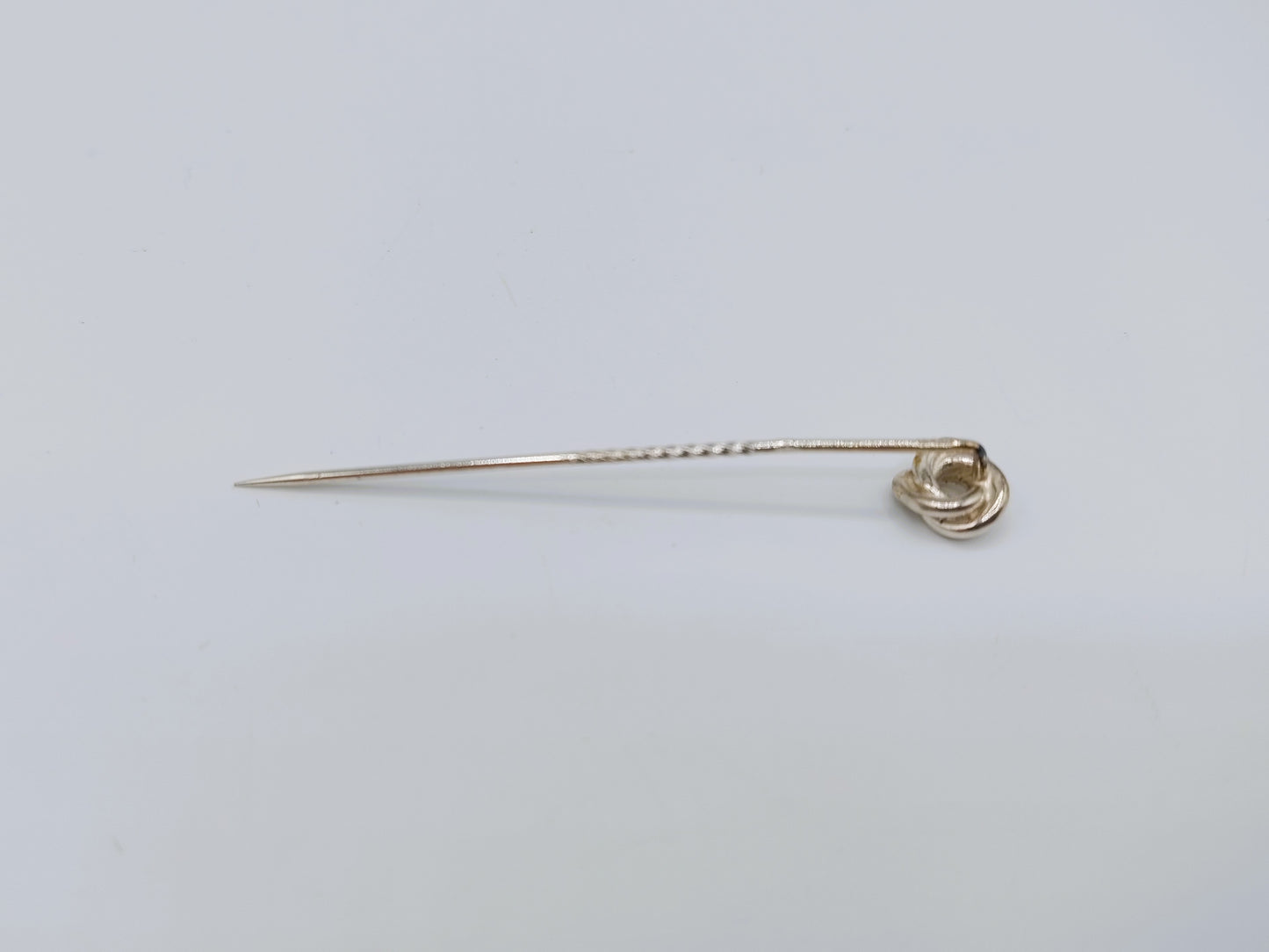 Zilveren reversspeld met knoop