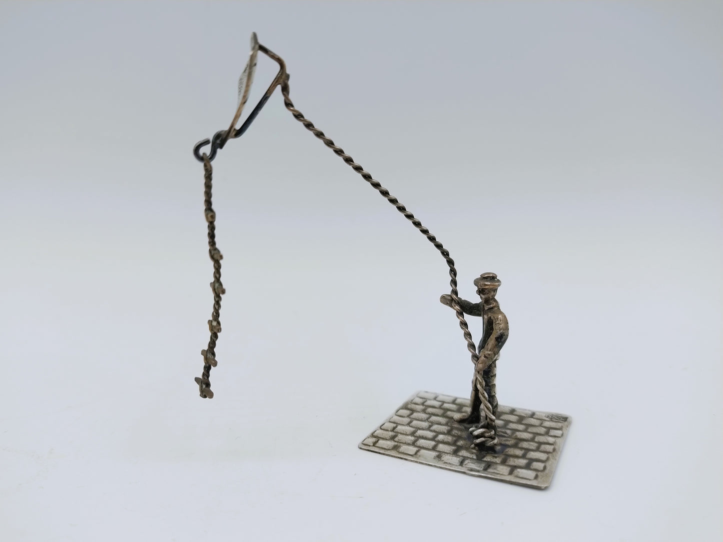 Zilveren miniatuur, man met vlieger, Amsterdam