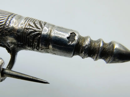 Silver brooch of knitting needle holder