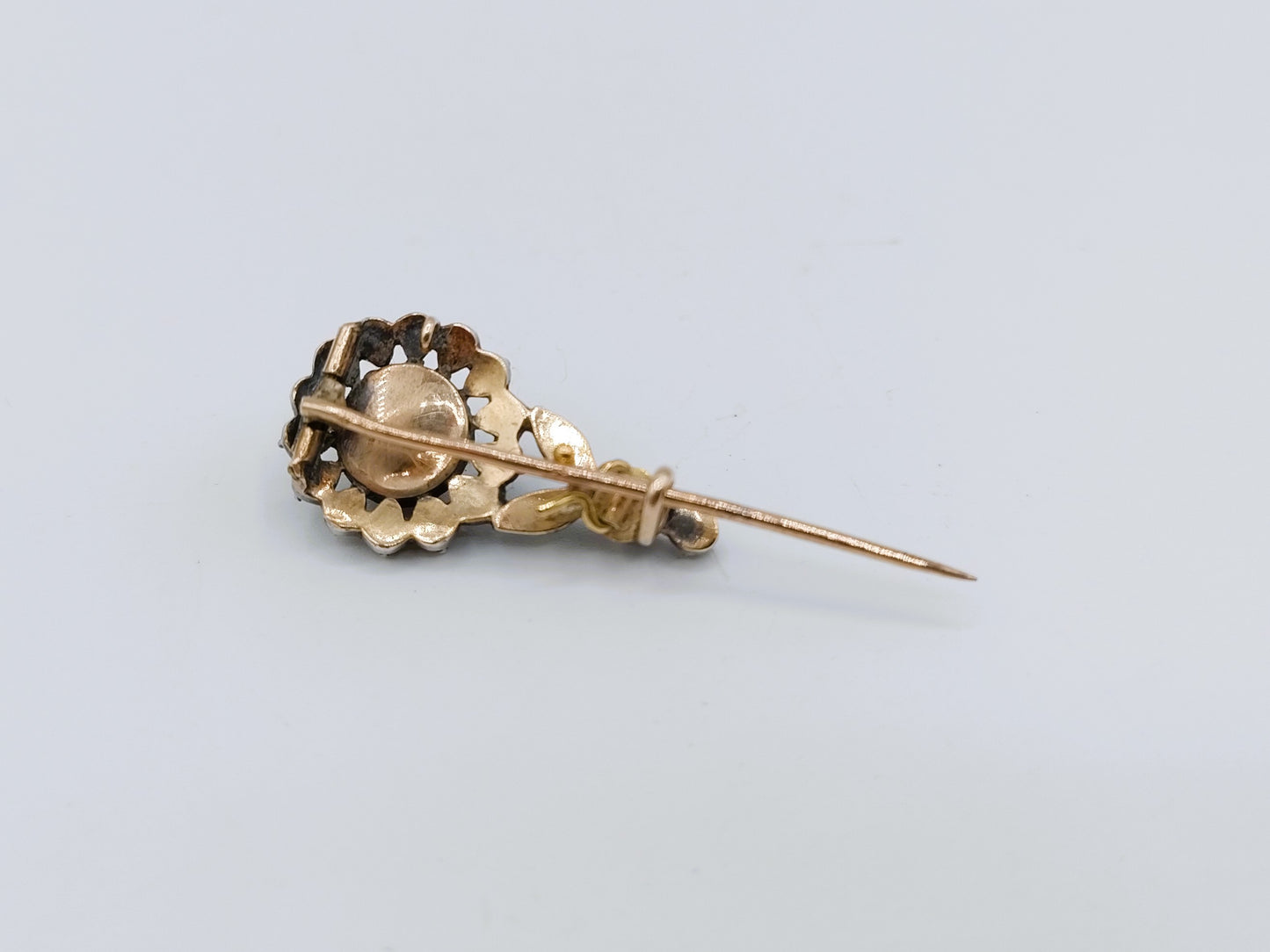 Gouden / zilveren broche met roosdiamanten