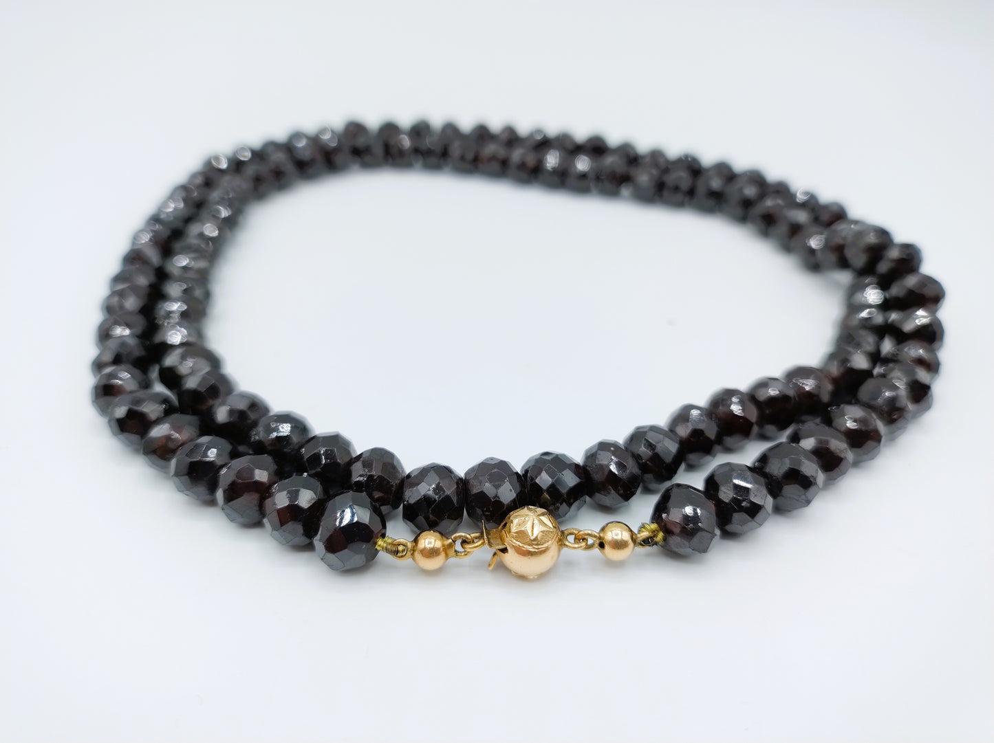 Garnet necklace with gold ball clasp, 72 cm