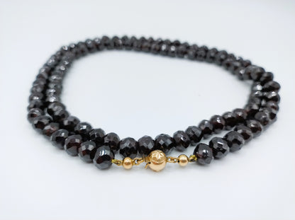 Garnet necklace with gold ball clasp, 72 cm