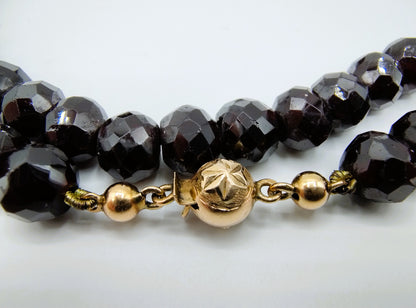 Garnet necklace with gold ball clasp, 72 cm