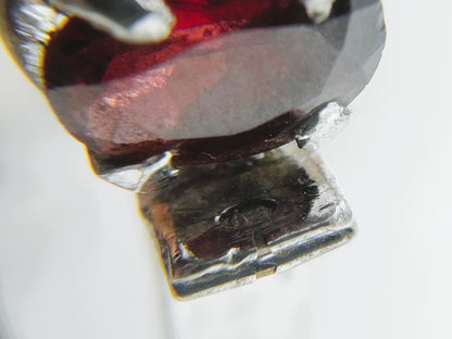 Silver tennis bracelet with red stones, 17.5 cm