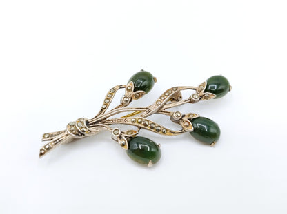 White metal flower brooch with jade and marcasite