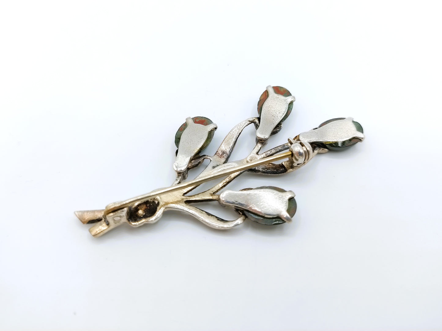 White metal flower brooch with jade and marcasite