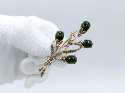 White metal flower brooch with jade and marcasite