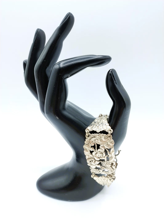 Zilveren schakelarmband met bloemmotieven, 17 cm